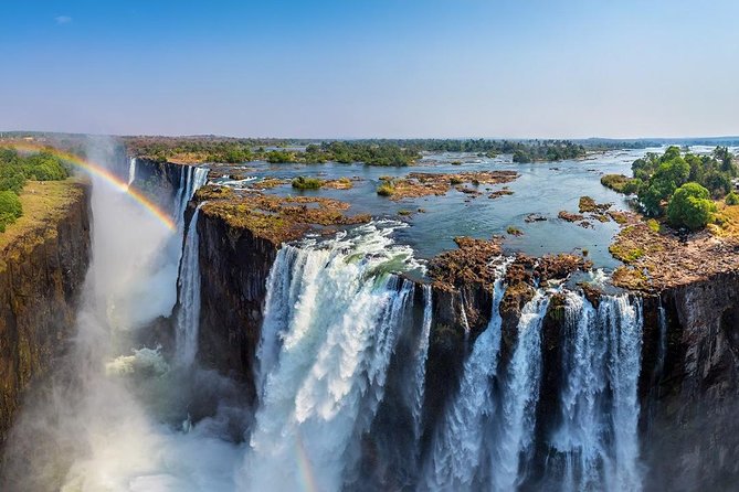 Full Day Victoria Falls incl lunch & Devils Pool 10h ZIMBABWEAN & ZAMBIAN SIDE - Speedboat and Livingstone Island: lunch with a front-row feel