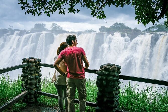 Guided Tour Of The Majestic Victoria Falls/Sunrise Tour - The Zimbabwe-Zambia bridge perspective you can’t ignore
