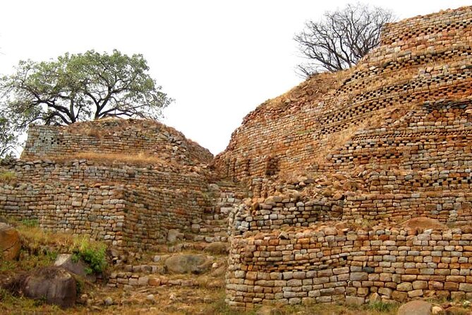 Khami Ruins & Matopos Silunguzi Village Day Tour! - Matopos Caves: Elephant Cave and Fish Cave Cave Paintings