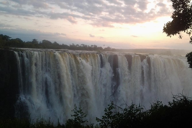 Livingstone Victoria Falls Tour Zambia And Zimbabwe Combo - Zambia side at 10:35 for 1.5 hours: gorge views, mist, and how seasons change the look
