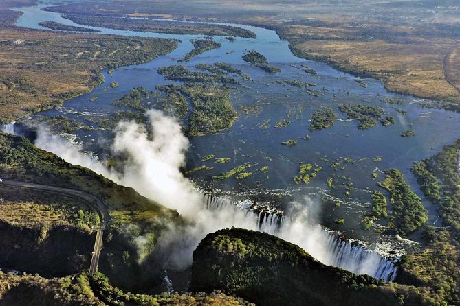 Victoria Falls Airport Transfer to Victoria Falls Town or Hotel - Comfortable Ride, Air-Conditioning, and a Little Water