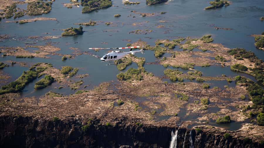 Victoria Falls:Explore the Zambezi Helicopter Experience - The main event: soaring over Mosi oa Tunya and the 1.7-kilometre curtain