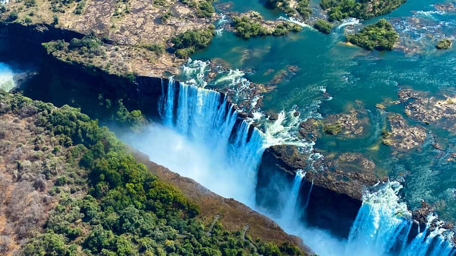 Victoria Falls:Explore the Zambezi Helicopter Experience - The Batoka Gorge stretch and Rapid Number 8, Midnight Diner