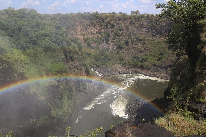 Zimbabwe & Zambia side Private Guided Tour of the Falls - Pickup, private pacing, and how a small group feels